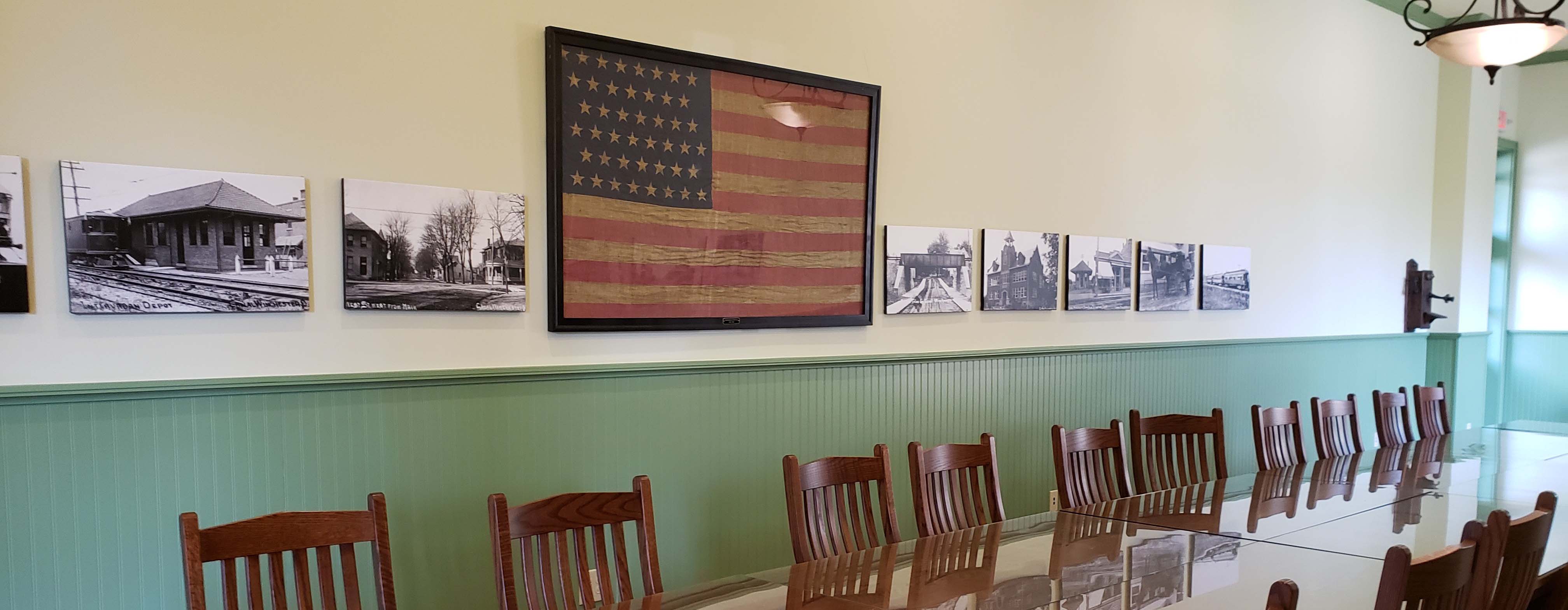 Meeting room inside the Interurban Depot with historic photos on the wall